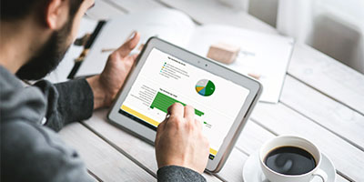 man studying data